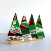 A Fiery Heart | Table-top Christmas tree in wooden stand |